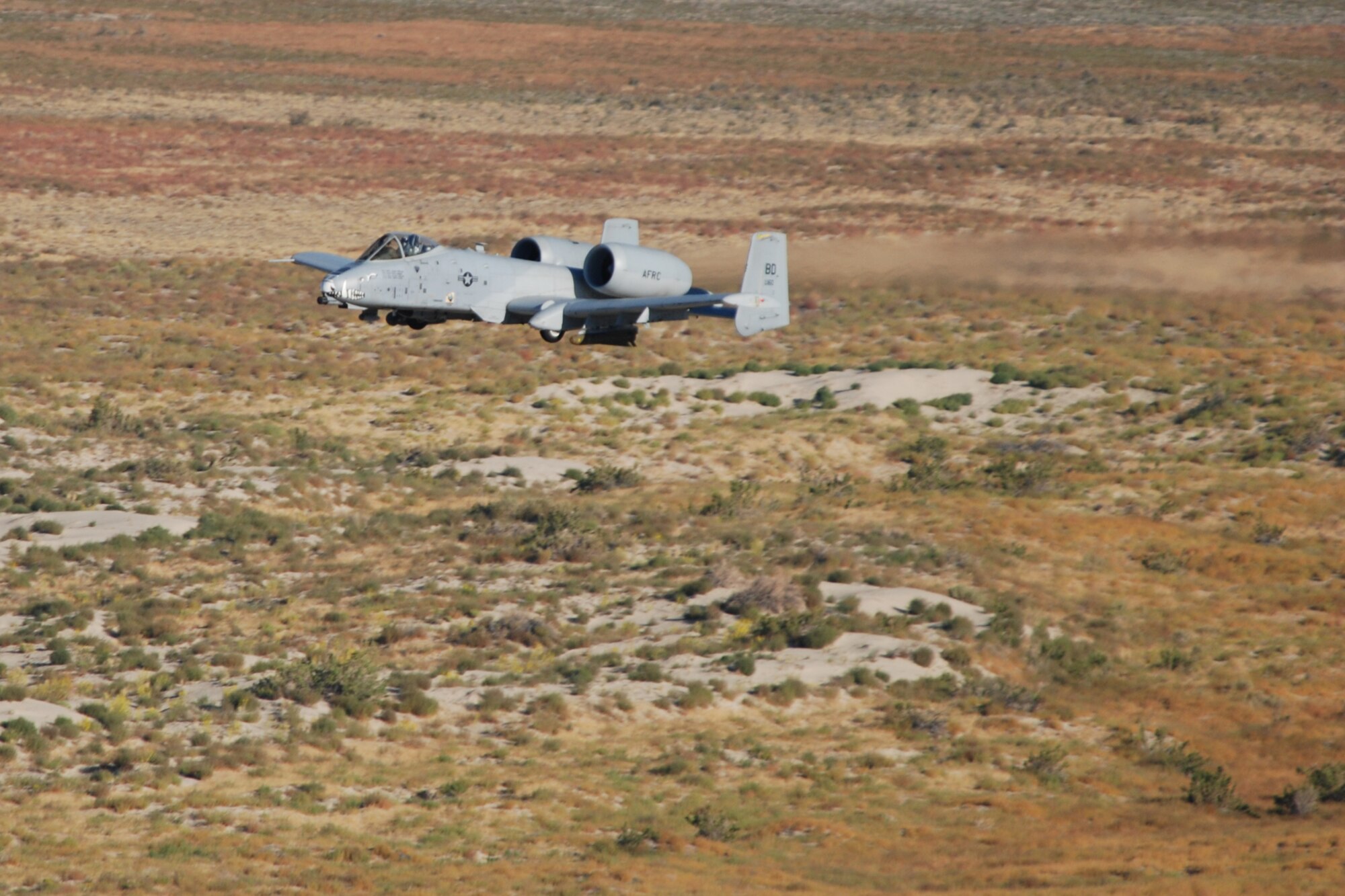 A 47th Fighter Squadron A-10 Thunderbolt II aircraft simulates a 30mm strafing attack on an enemy position at the Utah Test and Training Range in support of Patriot Rifle III, Hill Air Force Base, Utah, on September 11, 2009. More than 54 members of the 917th Wing from Barksdale Air Force Base, La., and six aircraft participated in the exercise. (U.S. Air Force photo/Master Sgt. Greg Steele) 