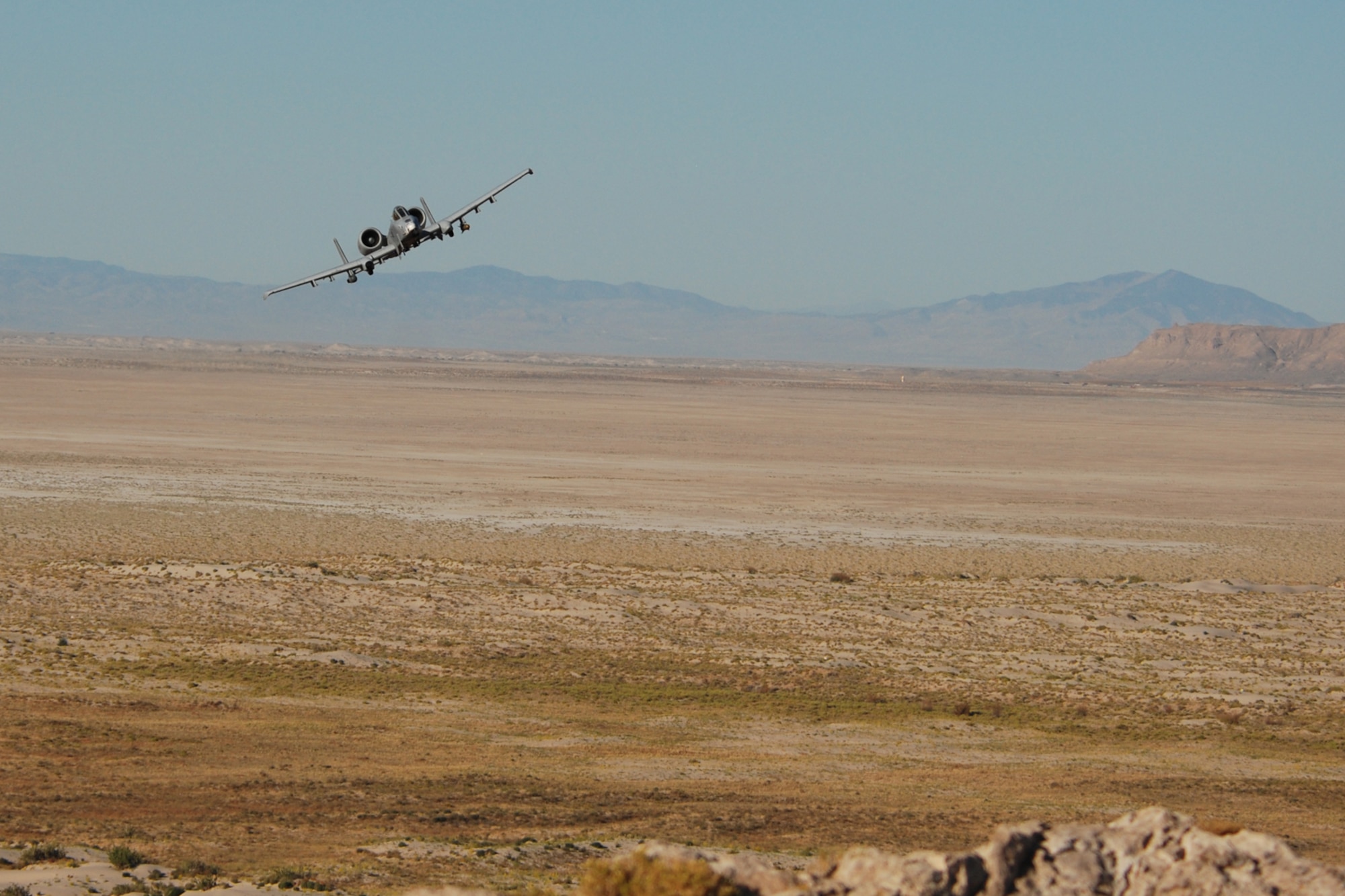 A 47th Fighter Squadron A-10 Thunderbolt II aircraft simulates a 30mm strafing attack on an enemy position at the Utah Test and Training Range in support of Patriot Rifle III, Hill Air Force Base, Utah, on September 11, 2009. More than 54 members of the 917th Wing from Barksdale Air Force Base, La., and six aircraft participated in the exercise. (U.S. Air Force photo/Master Sgt. Greg Steele) 