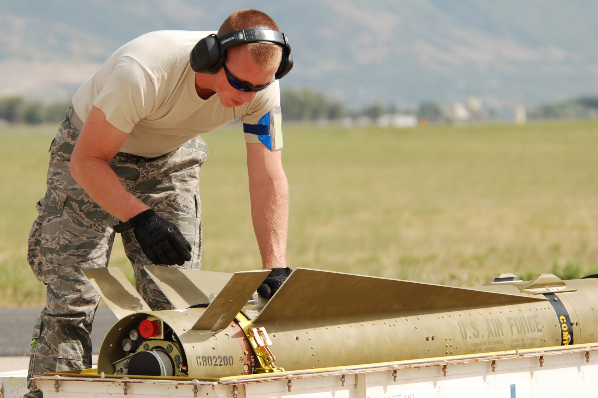 Senior Airman Cody Burt, 717th Aircraft Maintenance Squadron, weapons loader, inspects an AGM-65 Maverick missile before loading it on a 47th Fighter Squadron A-10 Thunderbolt II in support of Patriot Rifle III, Hill Air Force Base, Utah, on September 10, 2009. More than 54 members of the 917th Wing from Barksdale Air Force Base, La., and six aircraft participated in the exercise. (U.S. Air Force photo/Master Sgt. Greg Steele)