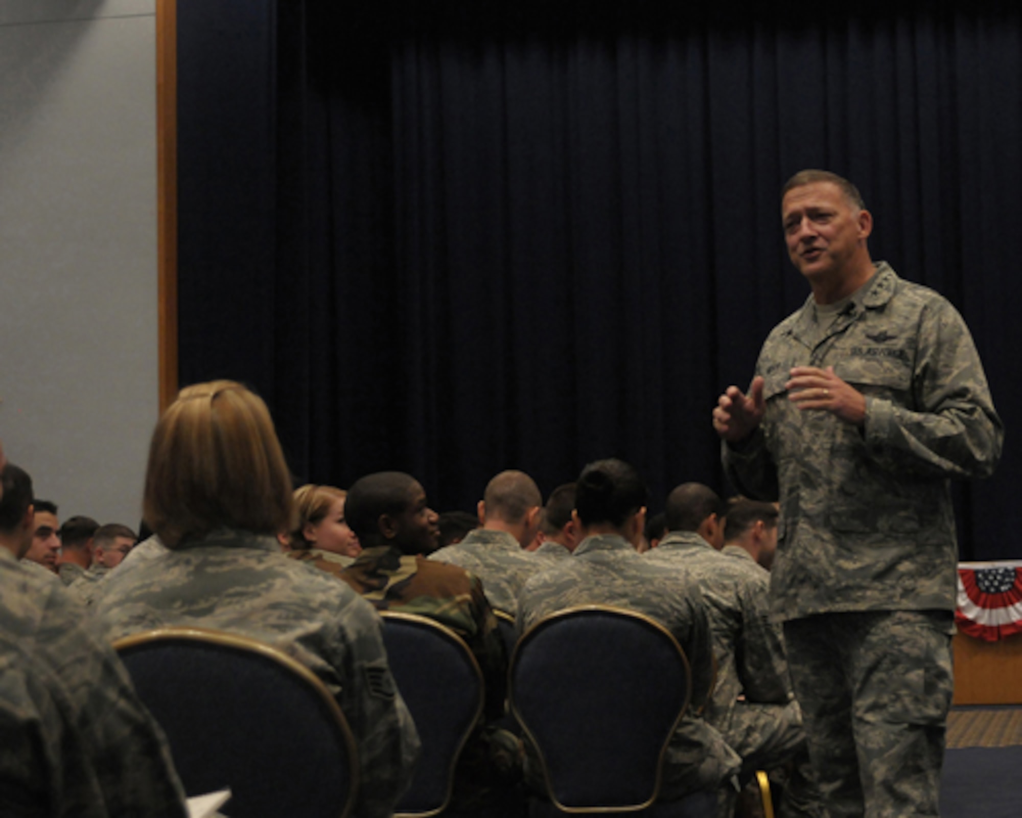 YOKOTA AIR BASE, Japan -- Gen. Gary North, Pacific Air Forces Commander, talks about his vision for the command during an Airman's Call at the Taiyo Community Center Sept. 24 during the general's first visit here since he took the reins of PACAF on Aug. 19. The general toured base facilities, hosted an Airman's Call and was the guest speaker at the base's Air Force Anniversary Ball during his visit. (U.S. Air Force photo/Airman 1st Class Sean Martin)