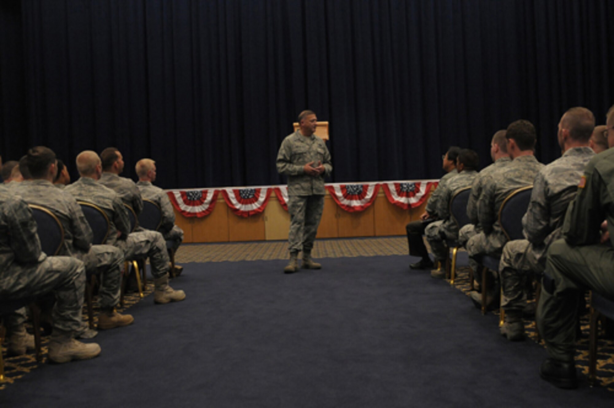 YOKOTA AIR BASE, Japan -- Gen. Gary North, Pacific Air Forces Commander, talks about his vision for the command during an Airman's Call at the Taiyo Community Center Sept. 24 during the general's first visit here since he took the reins of PACAF on Aug. 19. The general toured base facilities, hosted an Airman's Call and was the guest speaker at the base's Air Force Anniversary Ball during his visit. (U.S. Air Force photo/Airman 1st Class Sean Martin)