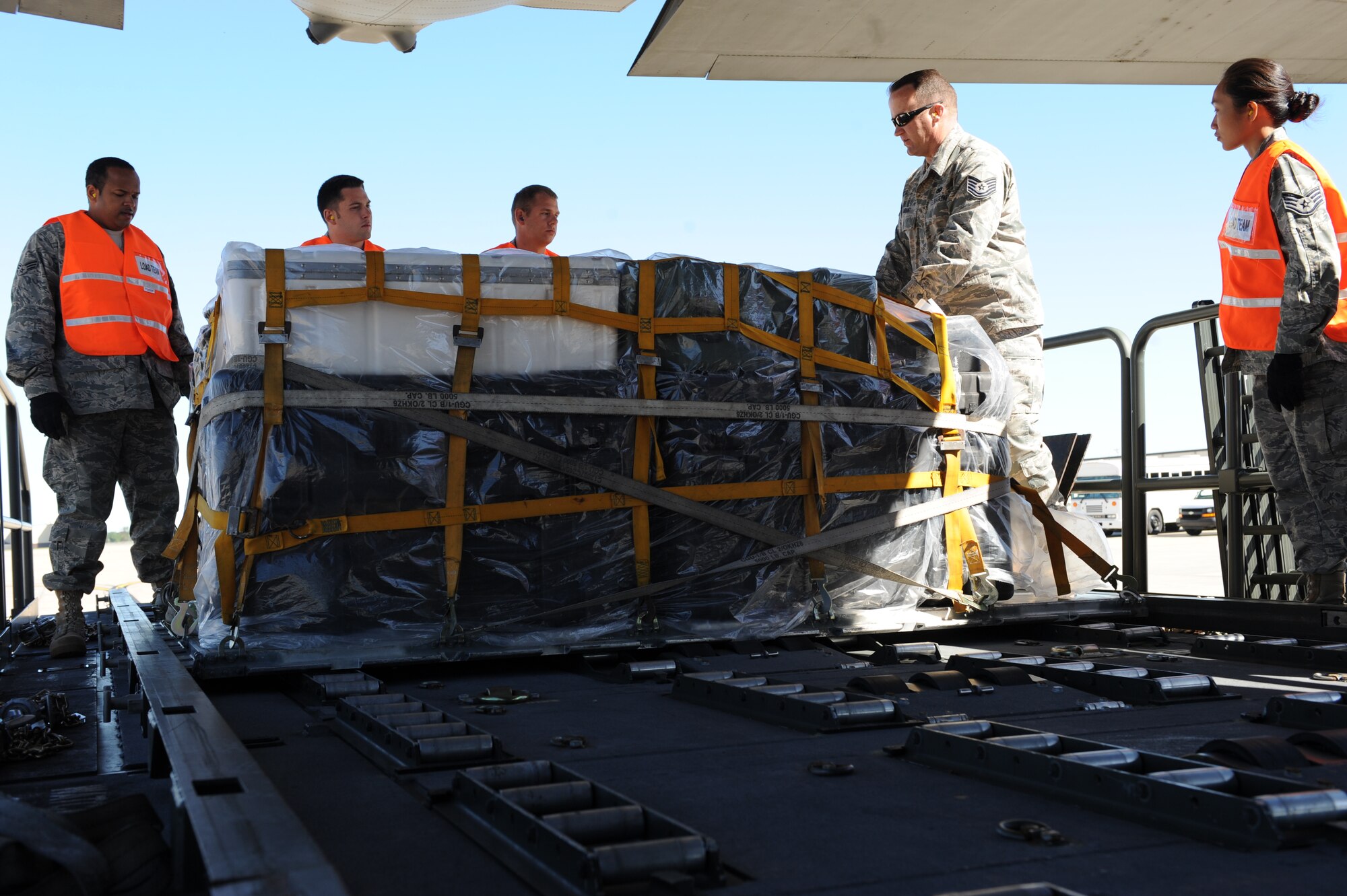 WHITEMAN AIR FORCE BASE, Mo. – Members of the 509th Logistics Readiness Squadron, load cargo onto a C-130, during the Nuclear Operation Readiness Exercise Sept 28. The NORE is in preparation of the upcoming Nuclear Operational Readiness Inspection Oct. 11. (U.S. Air Force photo/Senior Airman Cory Todd)