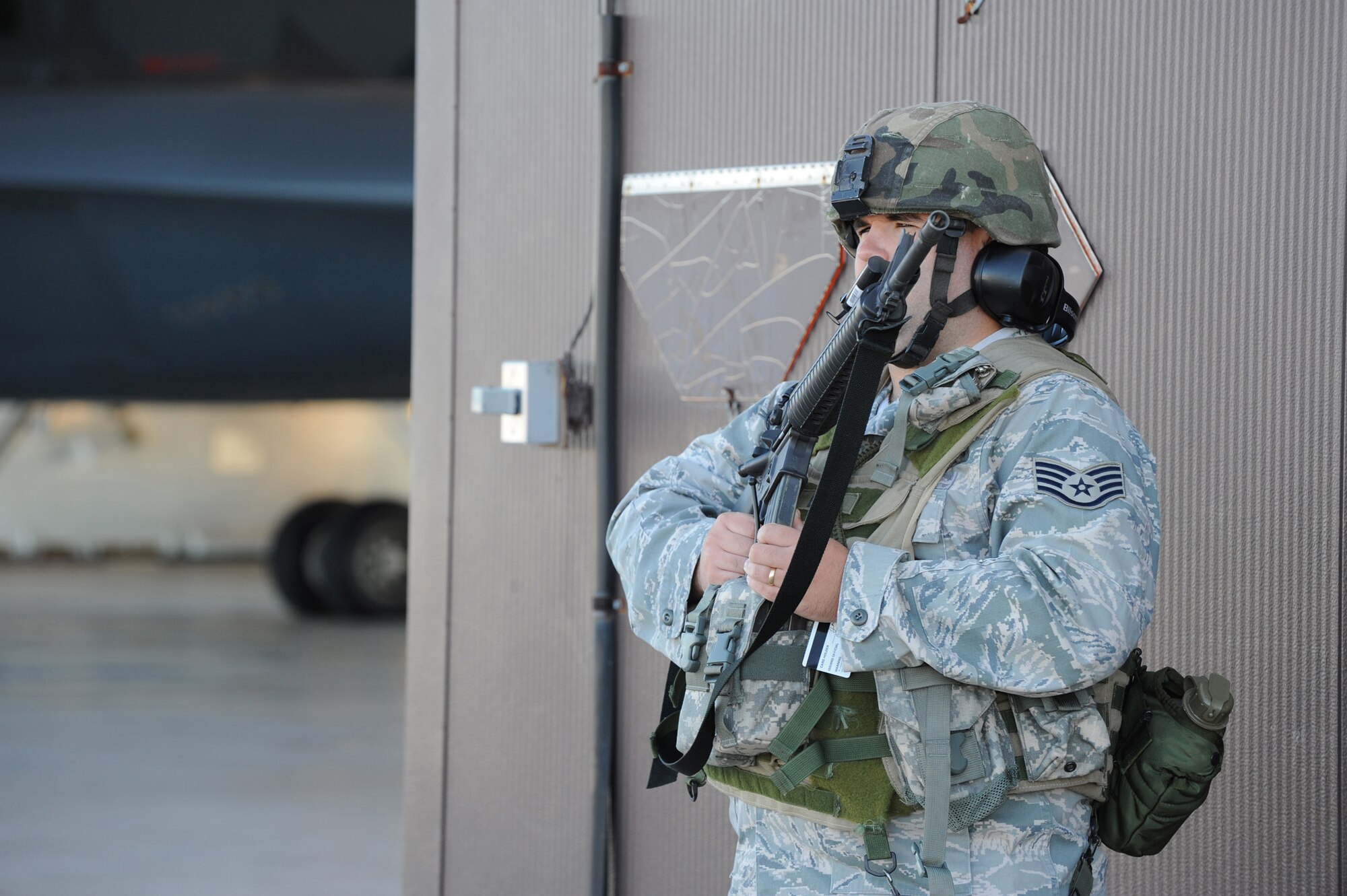 WHITEMAN AIR FORCE BASE, Mo.- Staff Sgt. Jason Birch, 509th Security Forces Squadron, stands guard outside one of the B-2 hangers during Nuclear Operation Readiness Exercise "Beast Walk," Sept 29. The NORE is in preparation of the Nuclear Operational Readiness Inspection Oct. 11. (U.S. Air Force photo/Airman 1st Class Carlin Leslie)