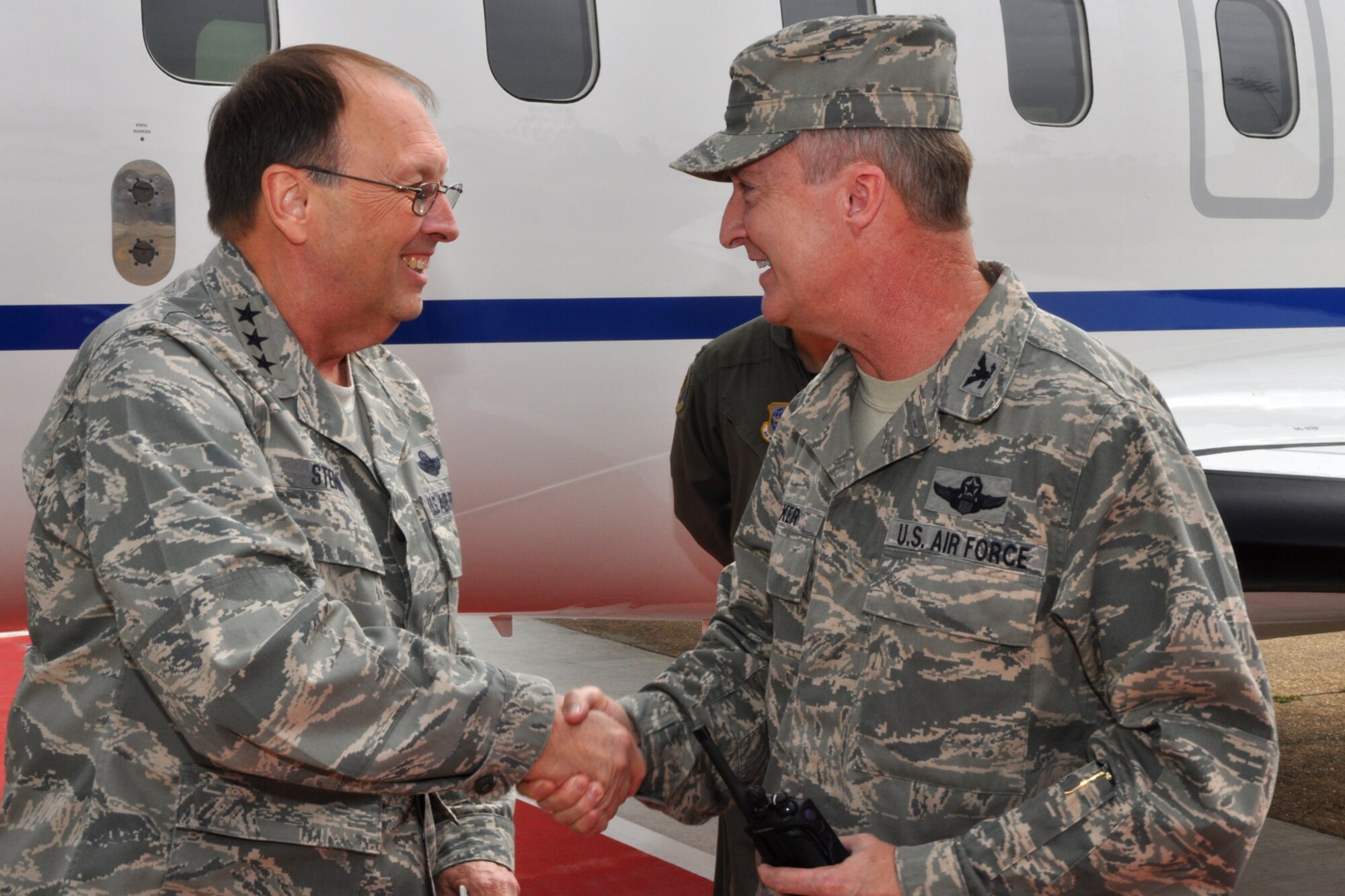 Lt. Gen. Charles E. Stenner, Jr., commander, Air Force Reserve Command, is greeted by Col. Edmund Walker, commander, 917th Wing, as his plane arrives at Barksdale Air Force Base, La., on September 25, 2009. General Stenner traveled to Barksdale for a meeting with Lt. Gen. Frank Klotz, who is the commander for the Global Strike Command, now headquartered here. While on base, General Stenner also met with Col. Steven Basham, 2nd Bomb Wing, commander, toured the 47th Fighter Squadron facilities, the 93rd Bomb Squadron headquarters building and Hangar 1, where maintenance is accomplished on B-52 Stratofortresses for the 917th Wing. (U.S. Air Force photo/Tech. Sgt. Jeff Walston)