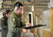 Maj. Travis Clark loads ammunition into a shotgun he fired Sept. 16, 2009, during a weapons qualification course for flight safety officers at McConnell Air Force Base, Kan. Major Clark, chief of safety for Air Force Reserve Command's 931st Air Refueling Group, attended the course with safety officers assigned the 22nd Air Refueling Wing, the host unit at McConnell. (U.S. Air Force photo/Tech. Sgt. Jason Schaap)