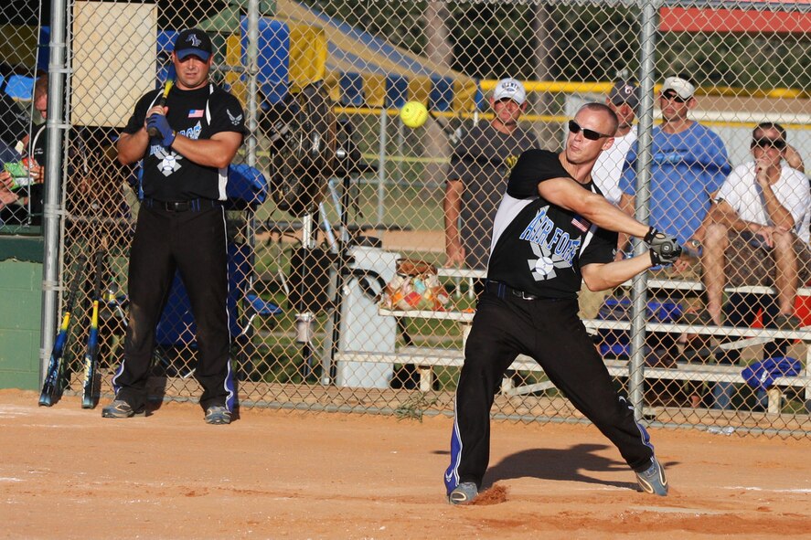 Staff Sgt. Nellis Myers from Nellis Air Force Base, Nev., gets a base hit during the Armed Forces Softball Championships. The Air Force men’s and women’s softball teams earned gold medals at the event. (Air Force photo by Steve Brown)