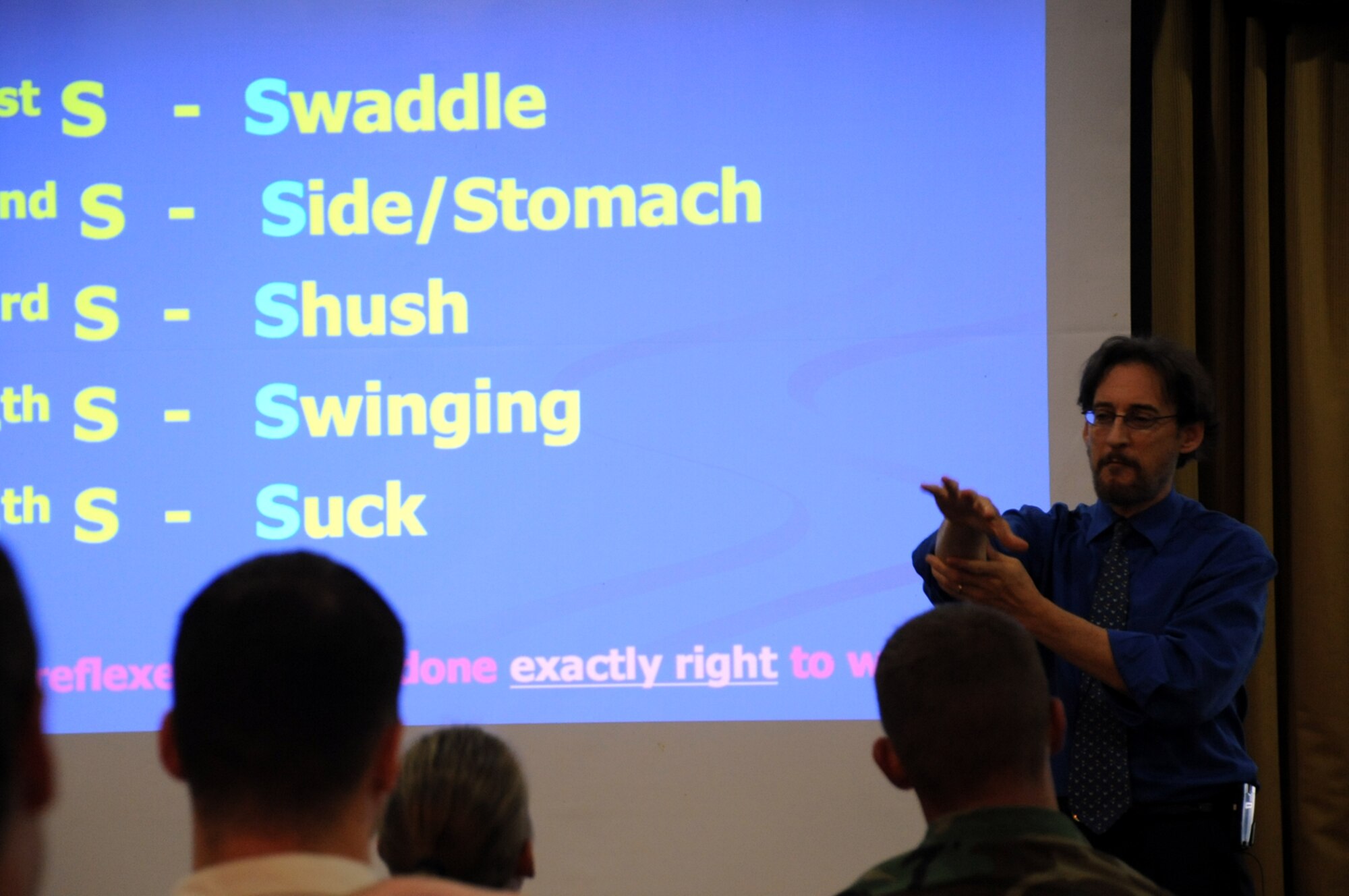 Dr. Harvey Karp, nationally renowned pediatrician and child development specialist, speaks to Joint Base McGuire-Dix-Lakehurst families Sept. 28 at the McGuire Community Center. Dr. Karp shared his “Happiest Baby/Toddler on the Block” techniques, including the five S’s to calm crying babies – swaddle, side/stomach, shush, swing and suck. His toddler techniques are proven to end 50 percent of tantrums in seconds. For more information, visit www.thehappiestbaby.com (U.S. Air Force photo/Senior Airman Bekah Phy) 