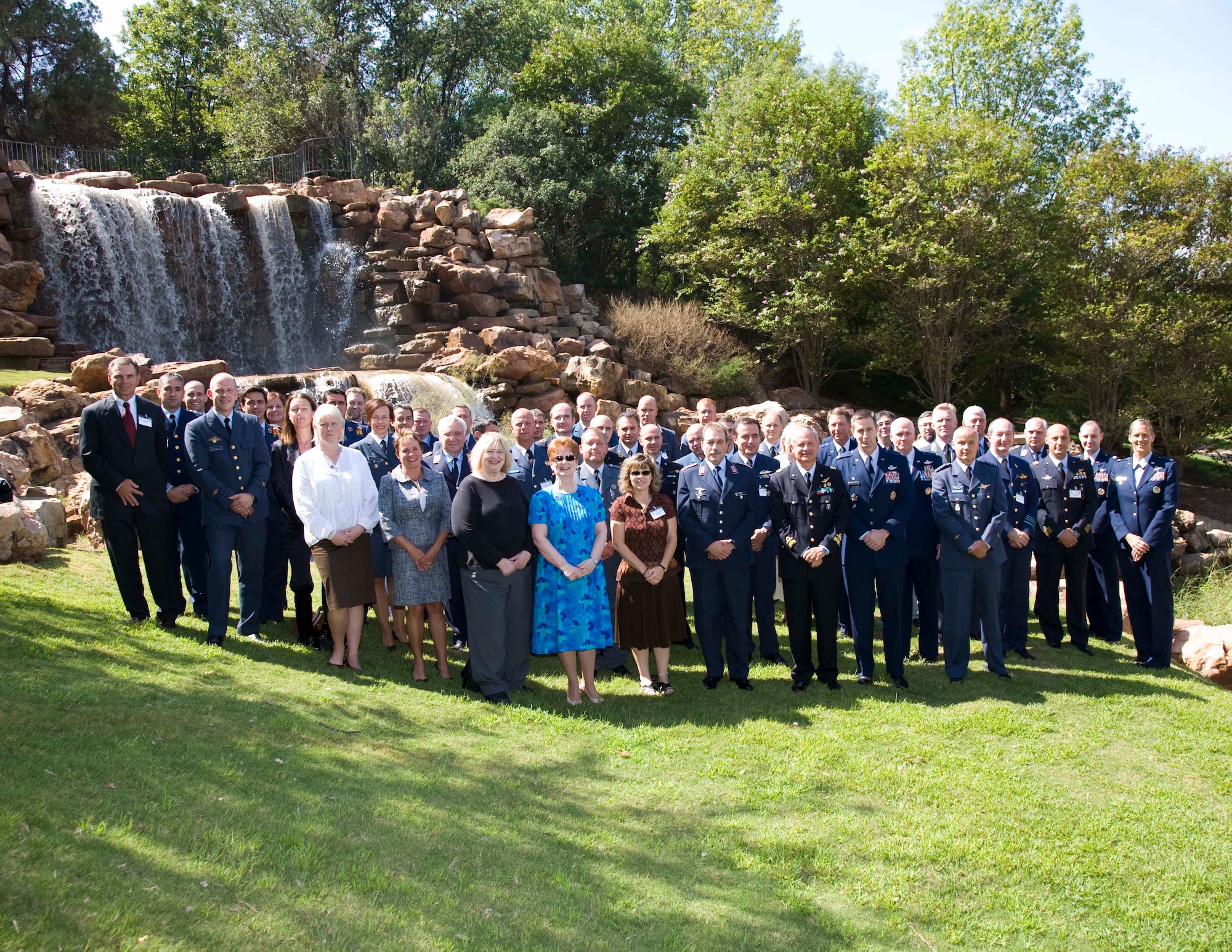 The Euro-NATO Joint Jet Pilot Training Program’s Steering Committee No. 58 pose in front of The Falls in Wichita Falls, Texas. The members discussed the flow of student pilots, instructor pilot training, leadership and command opportunities, maintenance statistics and plans for ENJJPT. (U.S. Air Force photo/ Lt. Col. Ternell Washington)     