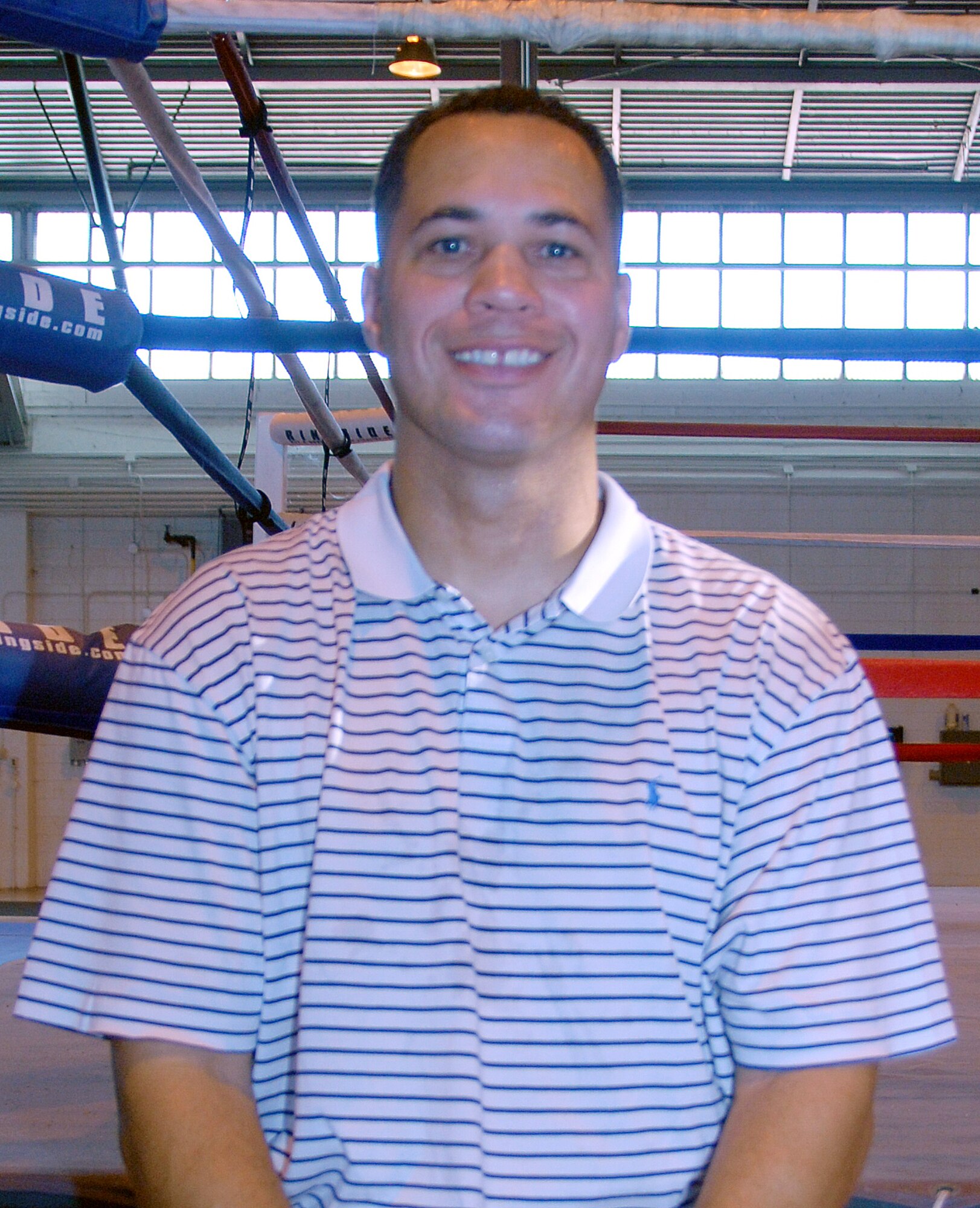 Senior Master Sgt. Mark Lanton, 908th Aeromedical Staging Squadron, was deployed to Iraq when he felt called to write a book. His book, "The Fight is Already Fixed," uses the analogical situations in a boxing ring and relates them, through faith, to situations in life and how people can use them to deal with life situations. (U.S. Air Force photo/Tech. Sgt. Christian Michael)
