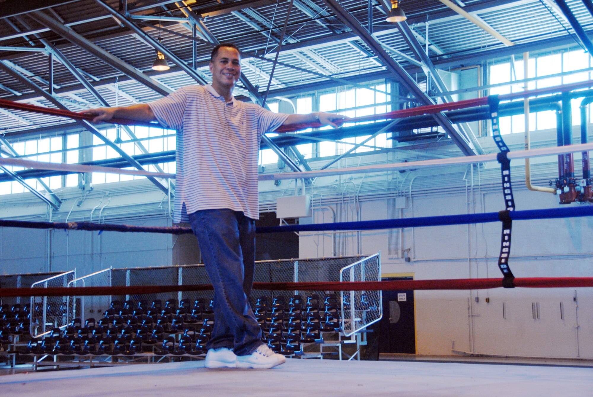 Senior Master Sgt. Mark Lanton, 908th Aeromedical Staging Squadron, was deployed to Iraq when he felt called to write a book. His book, "The Fight is Already Fixed," uses the analogical situations in a boxing ring and relates them, through faith, to situations in life and how people can use them to deal with life situations. (U.S. Air Force photo/Tech. Sgt. Christian Michael)