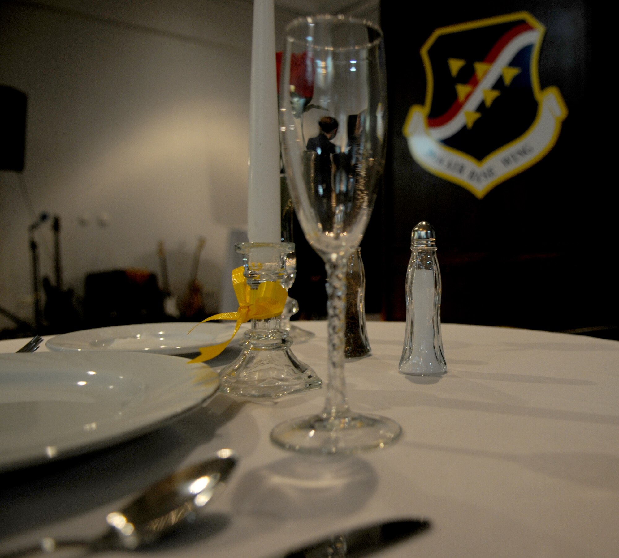 A Prisoner of War/Missing in Action table setting sits on display at the Air Force Ball Friday, Sept. 25, 2009, at Incirlik Air Base, Turkey. The display was one of many at the ball that highlighted the night’s theme of Heritage, Honor and Valor.(U.S. Air Force Photo/Senior Airman Alex Martinez)