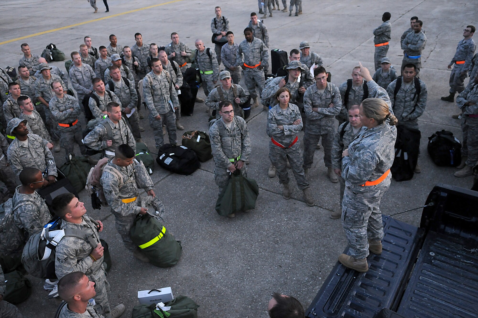 SPANGDAHLEM AIR BASE, Germany - Maj. Kelley Stevens, 52nd Equipment Maintenance Squadron commander, welcomes her Airmen back from a four-month deployment to Joint Base Balad, Iraq, Sept. 28. The 52nd EMS provided maintenance support for the 22nd Fighter Squadron. (U.S. Air Force photo/Airman 1st Class Nathanael Callon)
