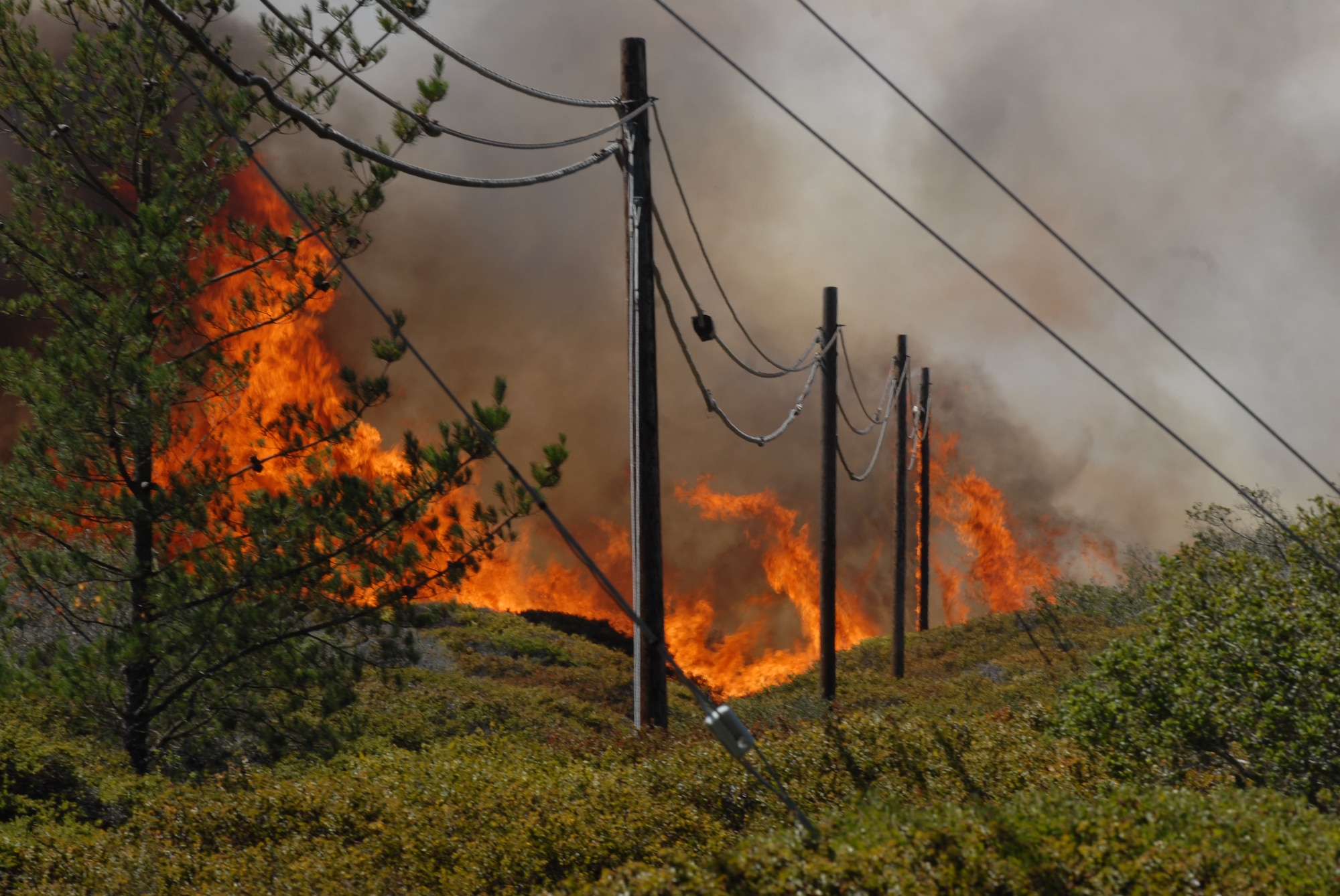 VANDENBERG AIR FORCE BASE, Calif. - Vandenberg Fire and local fire departments respond to a fire started near Vandenberg Middle School  here Sept. 30 at approximately 11:45. Over 350 acres were burned by the fire.  ( U.S. Air Force photo/Senior Airman Antoinette Lyons)
