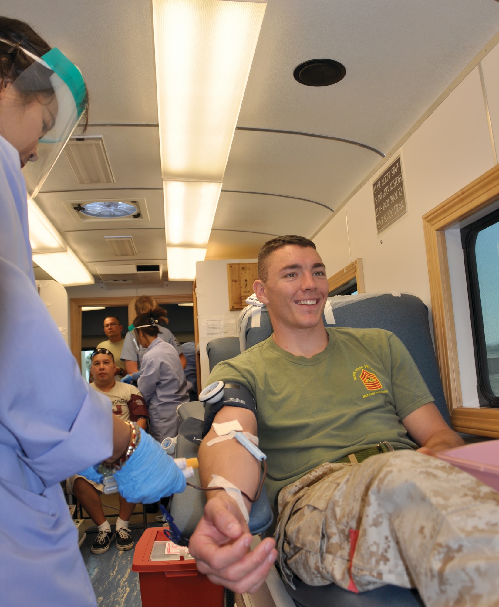 Marine Sgt. David Perry donated blood Saturday with the Armed Services Blood Program. He is normally stationed at Camp Pendleton, but is on temporary duty at March with the air arrival and departure control group. (U.S. Air Force photo by Capt. Ashley Norris)