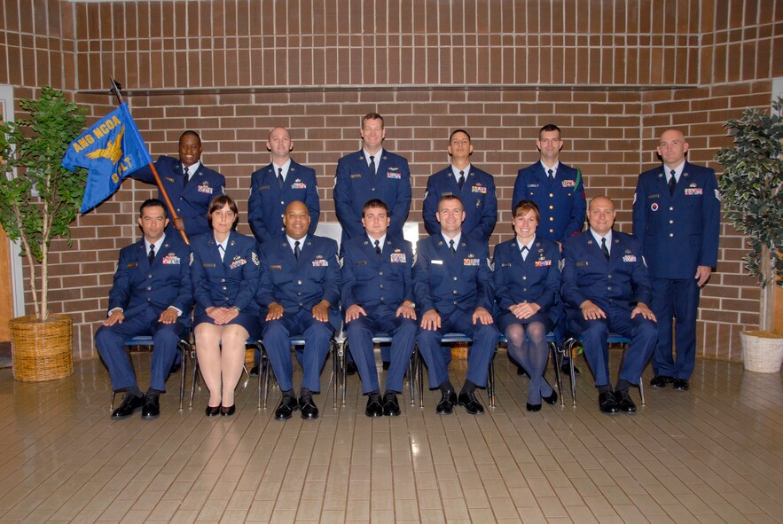 McGHEE TYSON AIR NATIONAL GUARD BASE, Tenn. -- The students of NCO Academy Class 09-6, C-Flight, gather at The I.G. Brown Air National Guard Training and Education Center here, Aug. 31, 2009.  Pictured (L-R standing) are Tech. Sgt. Andre L. Percell, Tech. Sgt. Joshua S. Hartman, Tech. Sgt. Jeffrey P. Burke, Tech. Sgt. Mario M. Burciaga, Petty Officer 1st Class Dominick J. Nasuto, Tech. Sgt. Don Pierson, (L-R sitting) Tech. Sgt. Henry S. Wilson, Tech. Sgt. Culeen C. Shaffer, Tech. Sgt. Craig D. Kirkland, Tech. Sgt. Jason R. Young, Tech Sgt. Robert J. Horacek, Tech. Sgt. Tera L. Johnson and Tech. Sgt. Justin R. Funk.  (U.S. Air Force photo by Master Sgt. Kurt Skoglund)