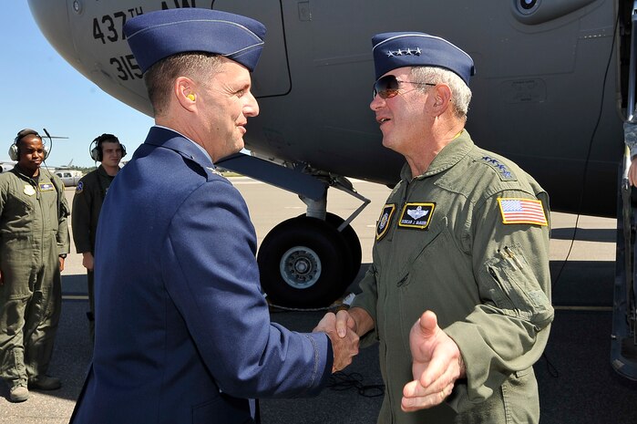 Col. John Wood greets Gen. Duncan McNabb on the flightline here Sept. 29. General McNabb visited Charleston AFB for the U.S. Transportation Command's Component Commanders Conference. USTRANSCOM is one of ten combatant commands in the Department of Defense and serves as the main supporting command for the movement of personnel, equipment and supplies. The conference was held to address and communicate USTRANSOM priorities for present and future objectives. General McNabb is the U.S. Transportation Command commander and Colonel Wood is the 437th Airlift Wing commander.