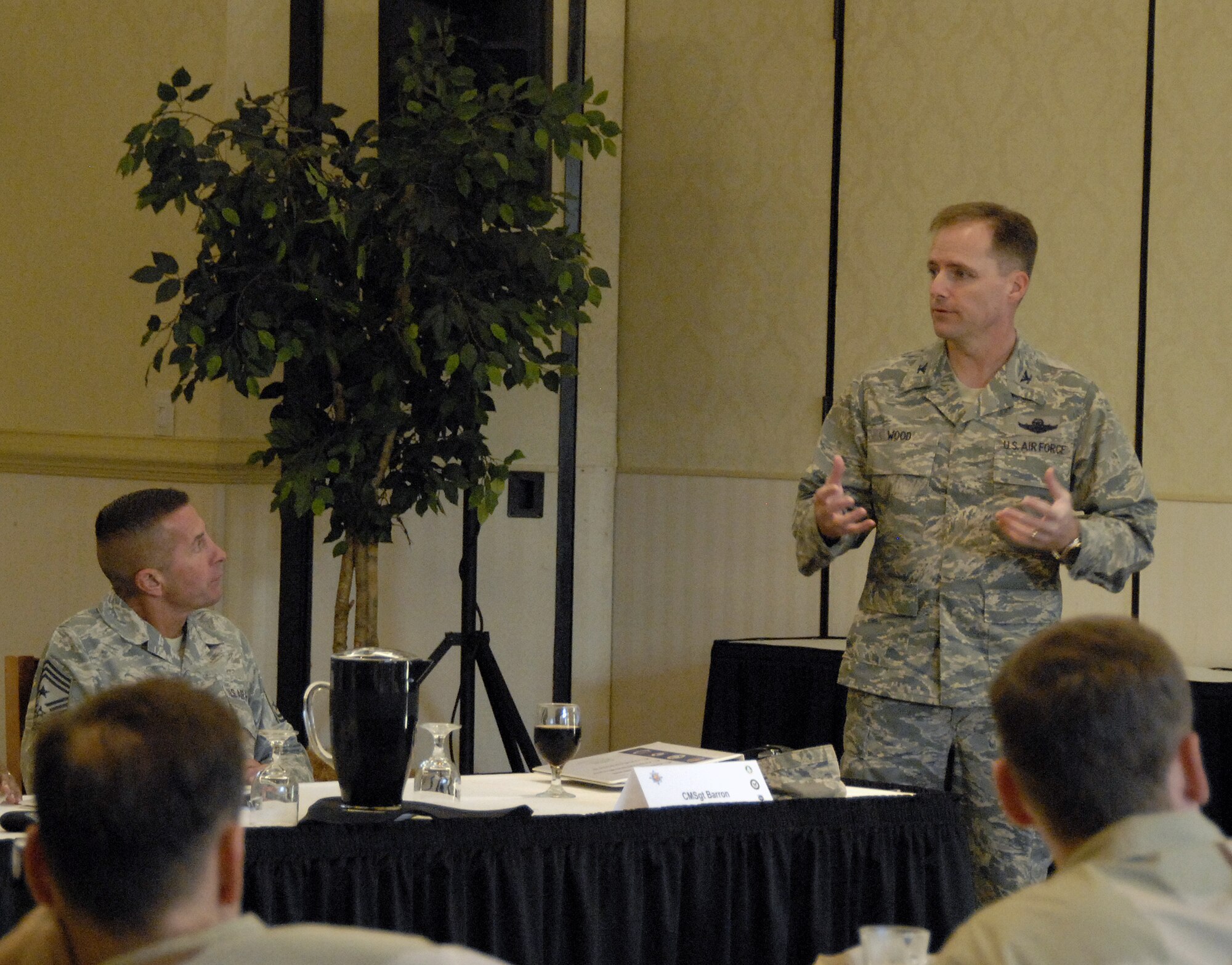 Col. John Wood briefs guests of the U.S. Transportation Command's Component Commanders Conference here Sept. 30. The colonel presented the opening remarks for the conference, outlining the 437th Airlift Wing mission, capabilities and accomplishments. Colonel Wood is the 437 AW commander. (U.S. Air Force photo/Daniel Bowles)