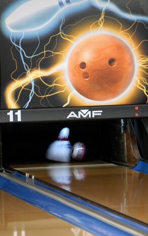 A bowler picks up a spare for their team in the last frame of the game during League Bowling night at the Starlifter Lanes here Sept. 25. League Bowling is held Fridays beginning at 7 p.m. until approximately 9:30 p.m. (U.S. Air Force photo/Staff Sgt. Daniel Bowles)