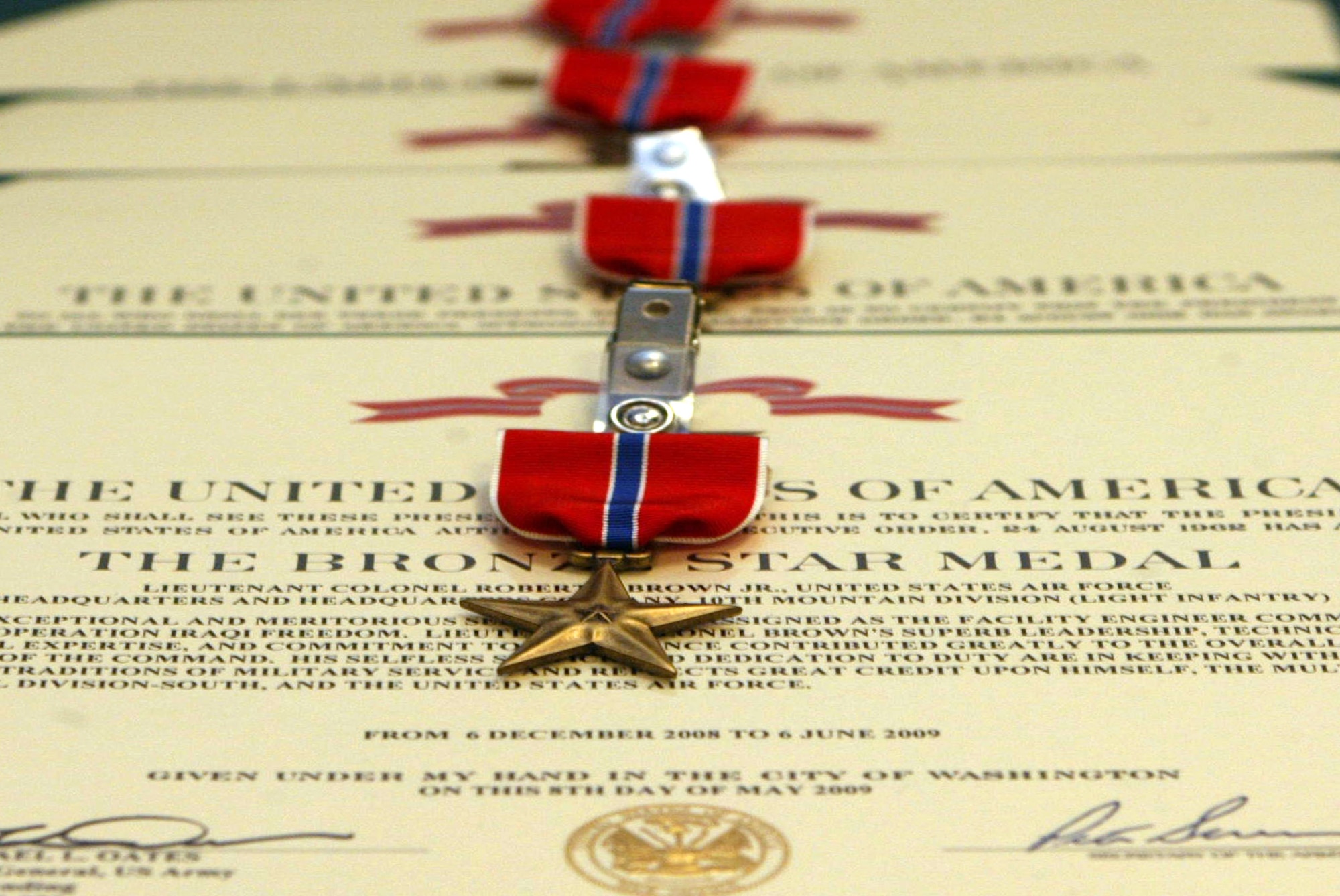 Lt. Col. Robert (Stan) Brown, Lt. Col. Edward Hogan, Lt. Col. Earle (Brian) Combs,
Lt. Col. Stephen Koenig, Lt. Col. Scott Carlin and Maj. Daniel Connors of the 628th Civil Engineer Flight, Dobbins Air Reserve Base, Ga. receive the Bronze Star Medal for exceptional and meritorious service while supporting Operation Iraqi Freedom Sep. 13. (U.S. Air Force photo/Don Peek)