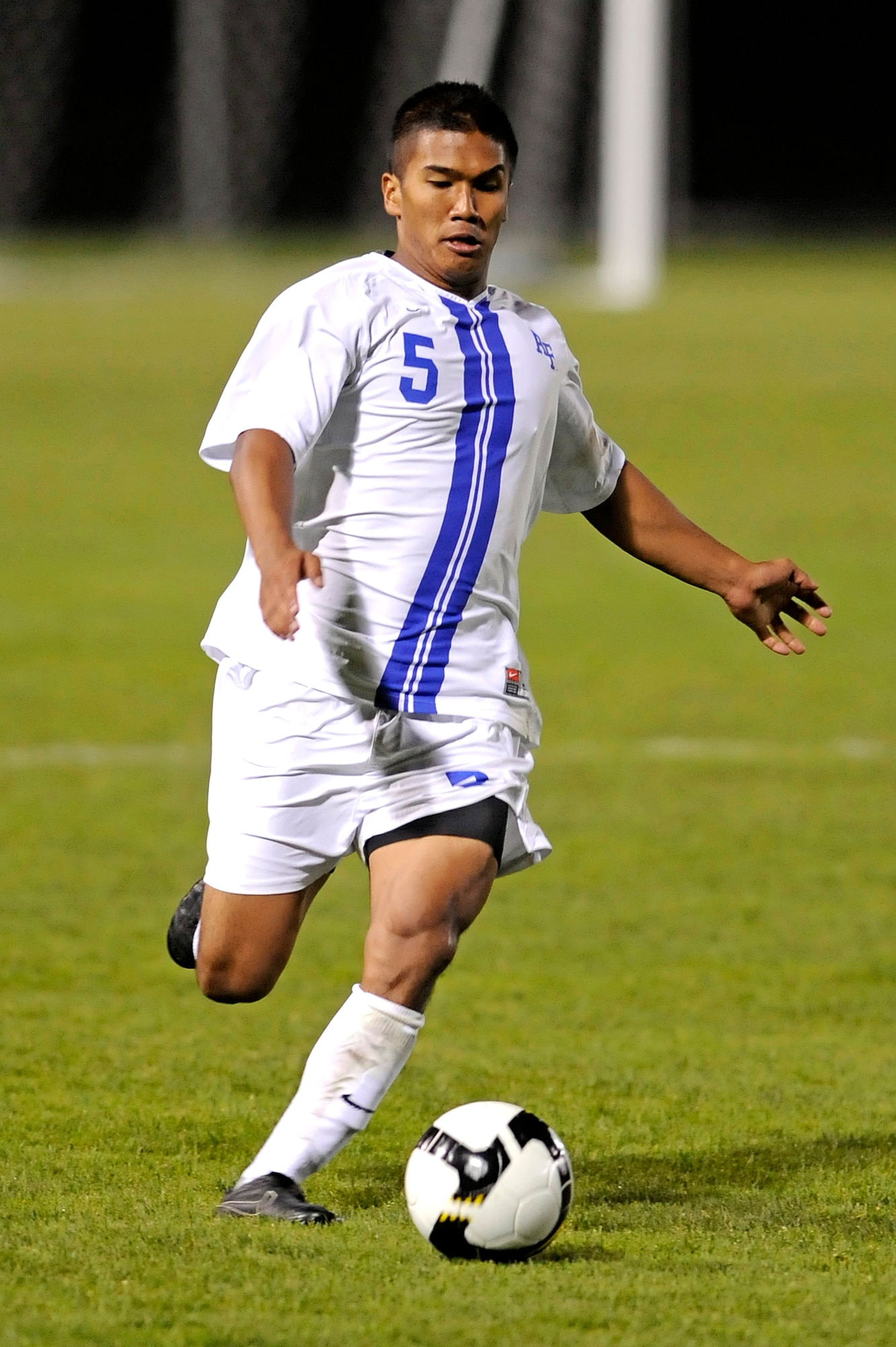 Freshman Zane Dydasco dribbles the ball upfield during the Air Force-Army soccer match at the U.S. Air Force Academy, Colo., Sept. 19, 2009. Dydasco scored the first goal of his career 2:16 into overtime to give the Falcons a 1-0 victory. (U.S. Air Force photo/Mike Kaplan)