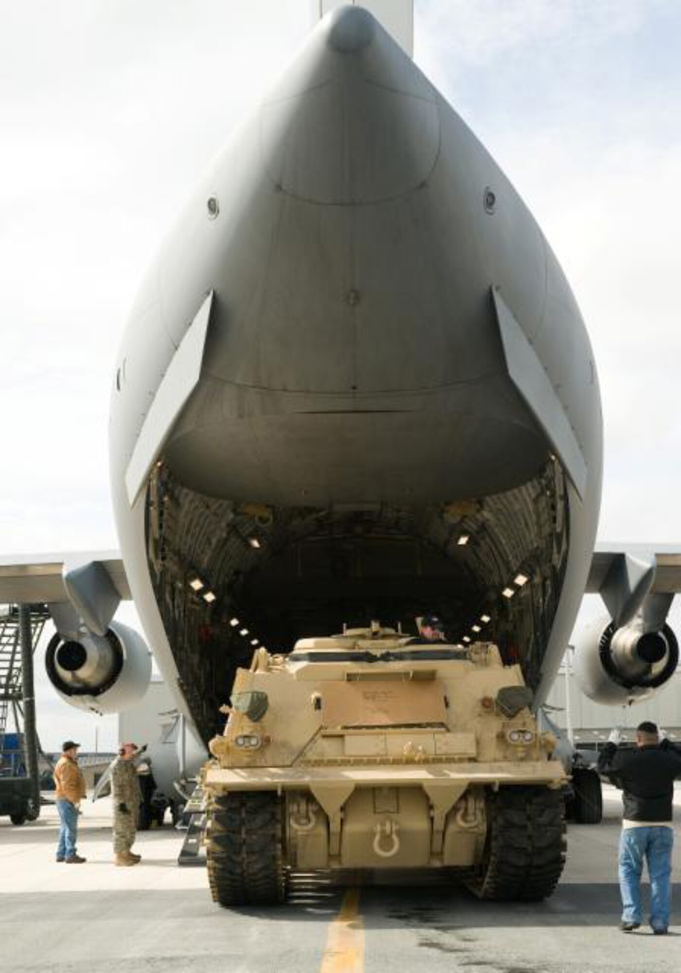 An M88A2 Heavy Equipment Recovery Combat Utility Lift and Evacuation System (HERCULES) is loaded into a C-17 Globemaster III aircraft at by the Dover AFB APEX team, March 10, 2009. The Hercules is used to safely tow and recover inoperative tanks. (U.S. Air Force photo by Jason Minto/Released) 