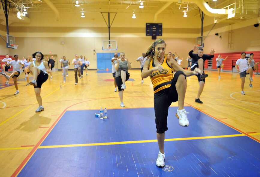 SHAW AIR FORCE BASE, S.C. -- Shauna McDonough, fitness center aerobics instructor, leads a class during the 2009 Viper Challenge, Sept. 29. The annual event allows for unit teams to go head-to-head in different sporting events throughout the day. The team that accumulates the most points receives the coveted Commander's Cup. (U.S. Air Force photo/Senior Airman Kathrine McDowell)