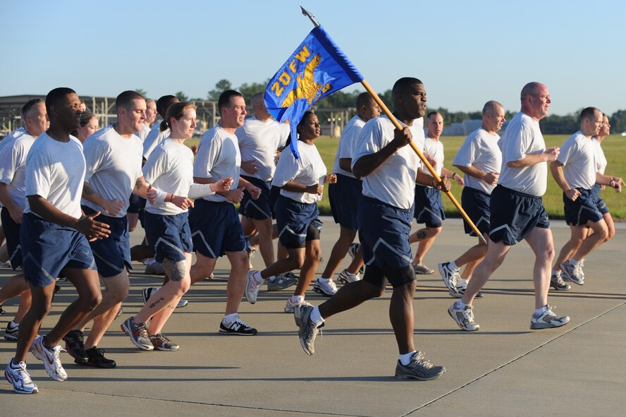 SHAW AIR FORCE BASE, S.C. -- Airmen of the 20th Fighter Wing run in formation on the flightline during the  Safety Day wing run Sept. 30. A wing formation run builds esprit de corps as it brings the different 20th FW groups to run together as a unit. (U.S. Air Force Photo/Senior Airman David Minor)