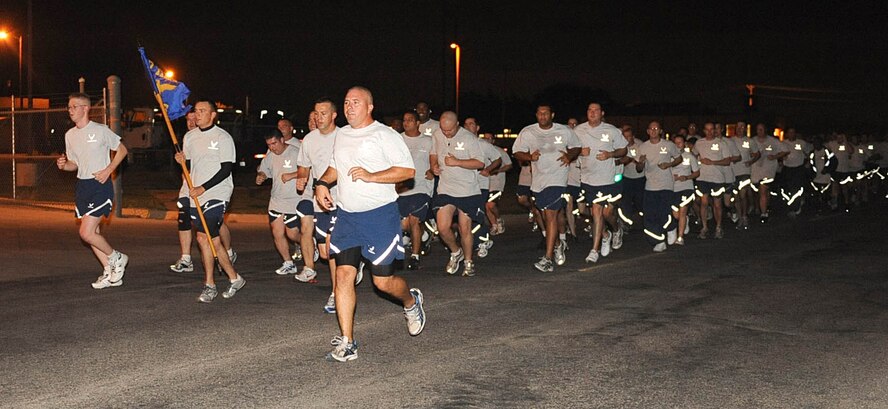 DYESS AIR FORCE BASE, Texas—More than 250 7th Component Maintenance Squadron Airmen run in formation during a 5:45 a.m. squadron run around the base here Sept 30. The team followed the lead of Maj. Jeffery Baldwin, 7 CMS commander, along a pre-determined route. (U.S. Air Force photo by Senior Airman Domonique Washington)