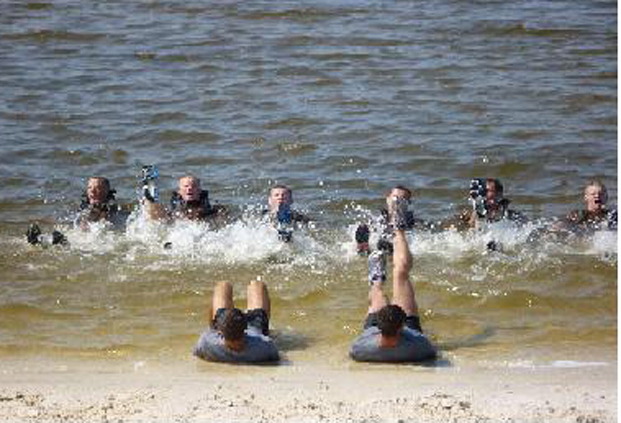 Cadets from Norwich University's Air Force ROTC Detachment 867 participate in flutter kicks led by senior cadets from the Air Force Academy as part of the special operations orientation professional development training.The cadets of detachment 867 were invited to participate in the orientation program recently. (U.S. Air Force photo/Maj. Jeff Cooper)