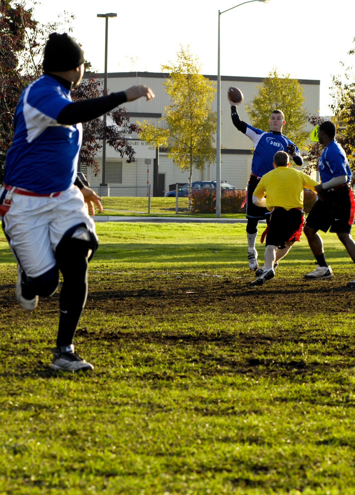 ELMENDORF AIR FORCE BASE, Alaska – Quarterback Earl Mason, 3rd Civil Engineer Squadron, throws a pass to teammate Garcia Tarver during game one of Elmendorf’s flag football finals Sept. 28. The 3rd CES lost its first game 7-22 and its second game 14-20. Mason completed a combined 21 of his 42 pass attempts for 229 yards, three touchdowns and an interception. (U.S. Air Force photo/Airman 1st Class Christopher Gross)