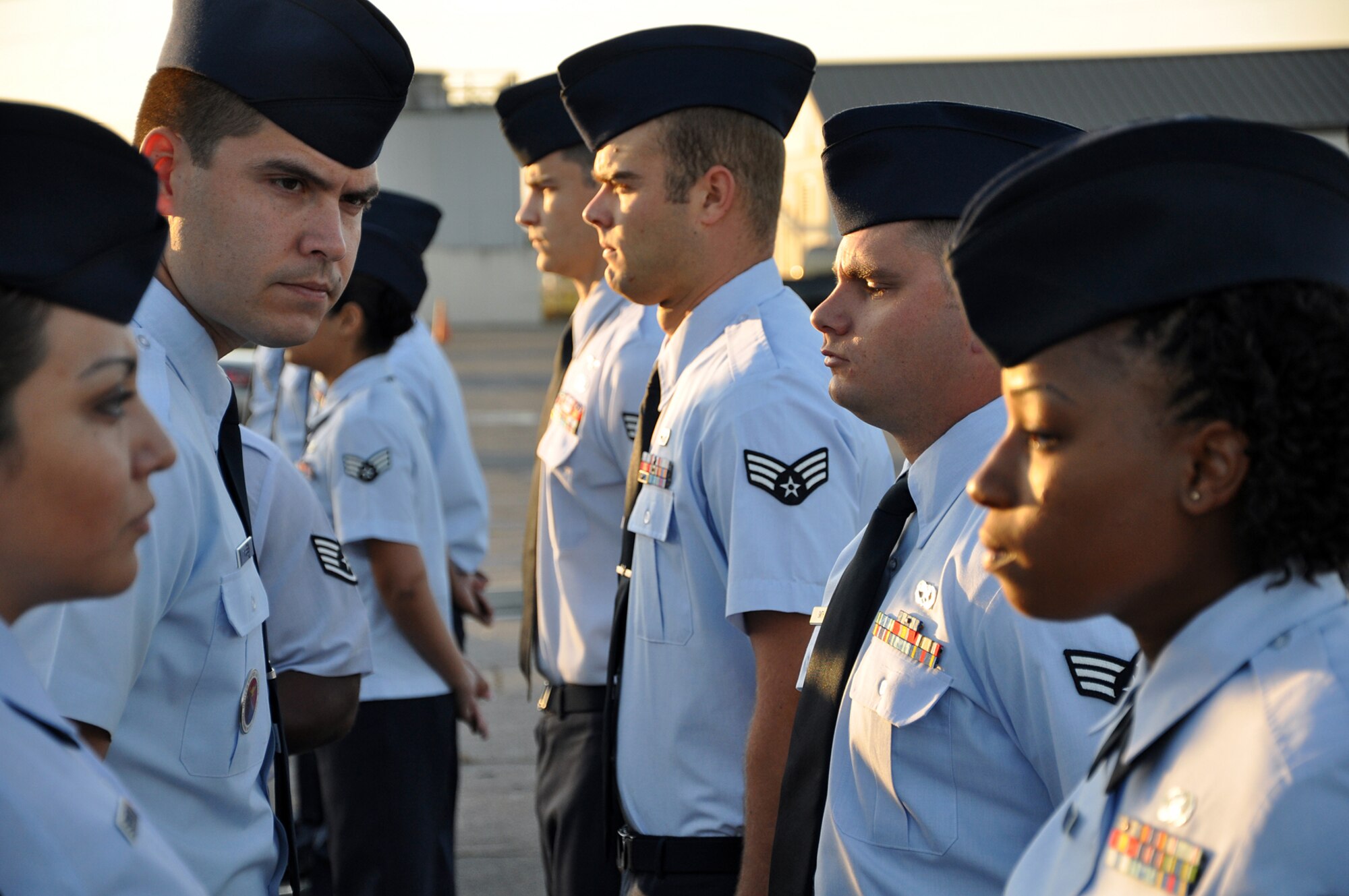 Florida sun breaks on the faces of Airmen Leadership School students as Staff Sgt. Raul Torres completes his open ranks inspection Sept. 29 here. ALS Class 10-Alpha began their journey nearly two weeks ago.  There are three weeks of instruction left that will cover roles and responsibilities of non-commissioned officers, dress and appearance, drill and community service. (Air Force photo/Staff Sgt. Bryan Franks)