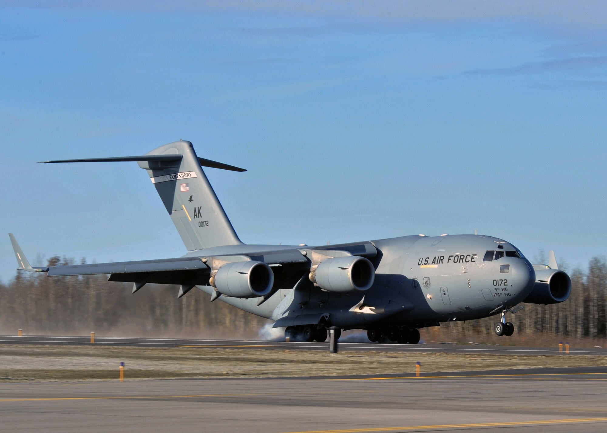 ALLEN ARMY AIRFIELD, Alaska -- A C-17 Globemaster III from the 517th Airlift Squadron does an assault landing on a new runway at Allen Army Airfield Sept. 29, 2009. The landing was performed for an audience gathered for a ribbon cutting ceremony in honor of the new runway. (U.S. Air Force photo/Senior Airman Laura Turner)