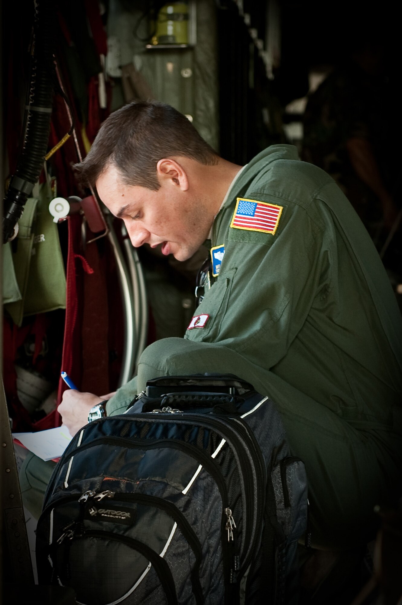 Tech. Sgt. Matt Atkinson, a loadmaster in the 123rd Airlift Wing, checks C-130 passenger manifests at the Kentucky Air National Guard Base in Louisville, Ky., on Sept. 12, prior to a flight to Puerto Rico. About 100 Kentucky Air Guardsmen will be supporting U.S. Southern Command airlift operations from San Juan through Oct. 10 as part of Operation Coronet Oak. (U.S. Air Force photo/Maj. Dale Greer)