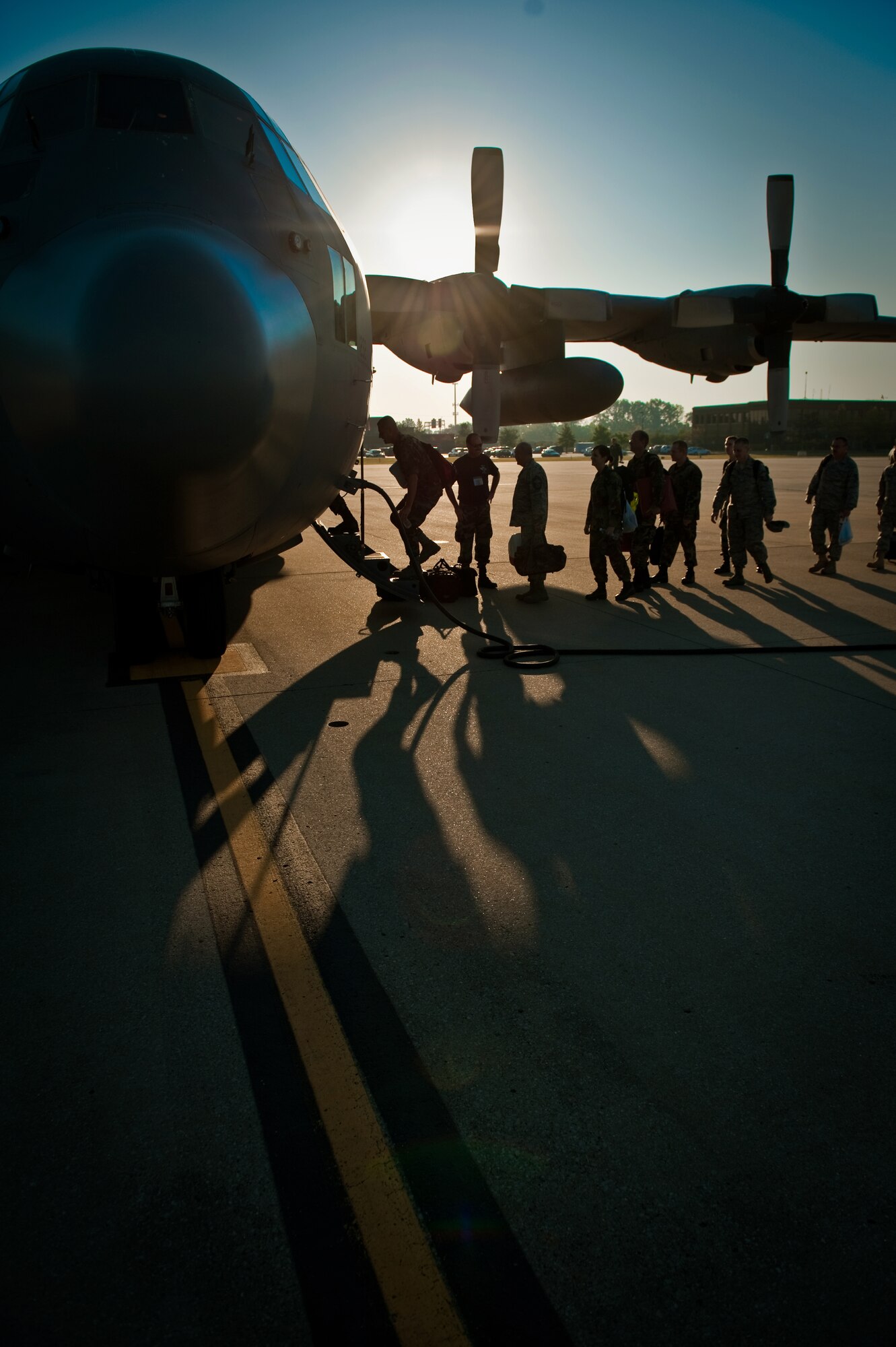 Members of the 123rd Airlift Wing board a C-130 aircraft at the Kentucky Air National Guard Base in Louisville, Ky., on Sept. 12. The troops are part of about 100 Kentucky Air Guardsmen will be supporting U.S. Southern Command airlift operations from San Juan, Puerto Rico, through Oct. 10 for Operation Coronet Oak. (U.S. Air Force photo/Maj. Dale Greer)