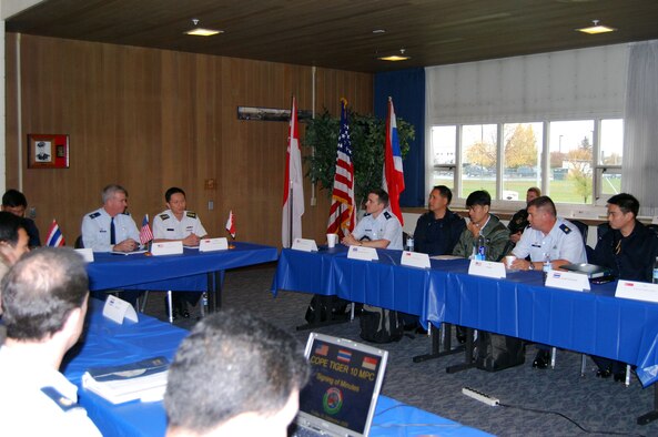 Representatives from Thailand, Singapore and the United States armed forces work out the details for the upcoming Cope Tiger exercise in Thailand in March 2010 at a conference held Sept 21-25 at Elmendorf Air Force Base, Alaska. Cope Tiger is an annual, multilateral aerial exercise which divides Thai, Singaporean and U.S. Air Force, Navy and Marine Corps aircraft into two mixed groups, pitting them against each other in a mock battle. The exercise also includes a two-phase humanitarian and civic assistance portion (Courtesy photo)