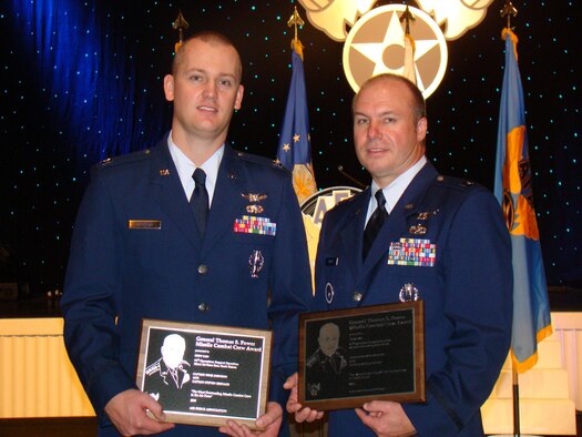 MINOT AIR FORCE BASE, N.D. -- The Gen. Thomas S. Power Award was granted to Capt. Benji Johnson, 91st Operations Support Squadron weapons and tactics instructor and Capt. Stephen Grinage, 392nd Training Squadron instructor at Vandenberg AFB, Calif., for the 2008 award period for the best overall missile crew in the Air Force during the Air Force Association 2009 Air and Space Conference in Washington, D.C. Sept. 14 to 16. (Courtesy photo)