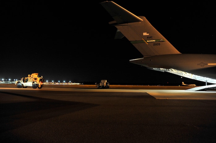 A Mine-Resistant, Ambush-Protected Armored All Terrain vehicle, or MATV, waits to be loaded onto a C-17 at Charleston AFB, S.C., Sept. 30. The MATV was one of the first two vehicles ever flown into Afghanistan to support combat missions. The C-17 is based out of McChord AFB, Wash. (U.S. Air Force photo/James M. Bowman)