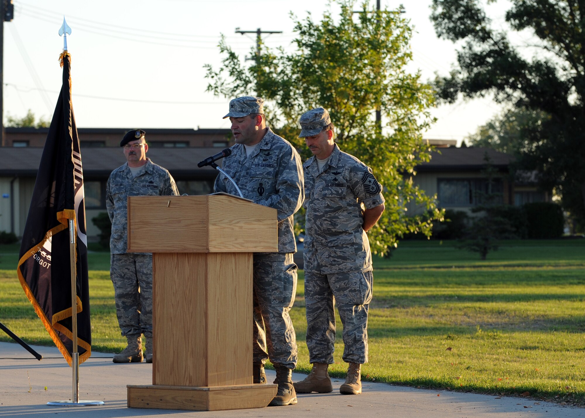 MINOT AIR FORCE BASE, N.D. -- Col. Christopher Ayres, 91st Missile Wing commander, reads the first few names on a list of missing military members during the opening ceremony in honor of POW/MIA day here, Sept. 25. POW/MIA day is a day of remembrance for all those who have served our nation’s calling, but not yet returned home. (U.S. Air Force photo by Staff Sgt. Keith Ballard.)