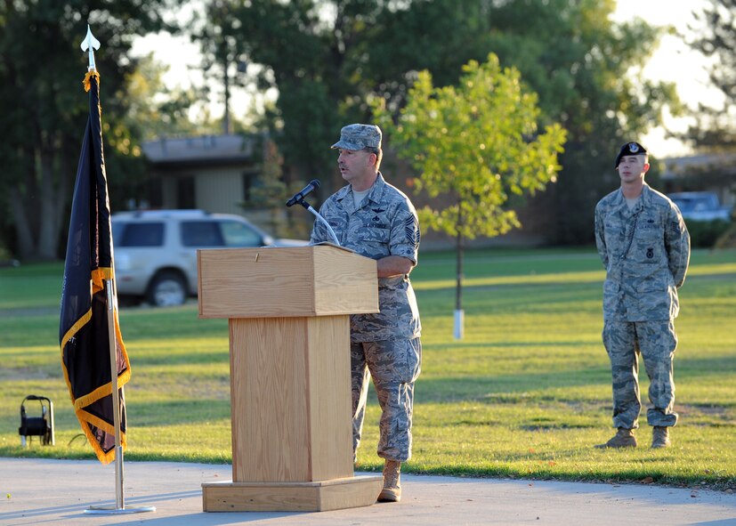 MINOT AIR FORCE BASE, N.D. -- Chief Master Sgt. Gregory Fleming, 91st Missile Wing command chief master sergeant, addresses the audience during the opening ceremony in honor of POW/MIA day here, Sept. 25. POW/MIA day is a day of remembrance for all those who have served our nation’s calling, but not yet returned home. (U.S. Air Force photo by Staff Sgt. Keith Ballard.)