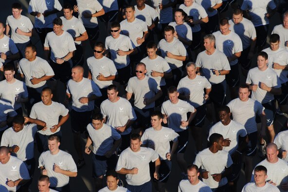 SHAW AIR FORCE BASE, S.C. -- Airmen from the 20th Fighter Wing run in formation along the flight line during Wing Safety Day Sept. 30. A wing formation run builds esprit de corps as it brings the different 20th FW groups to run together as a unit. (U.S. Air Force photo/Senior Airman Matt Davis)