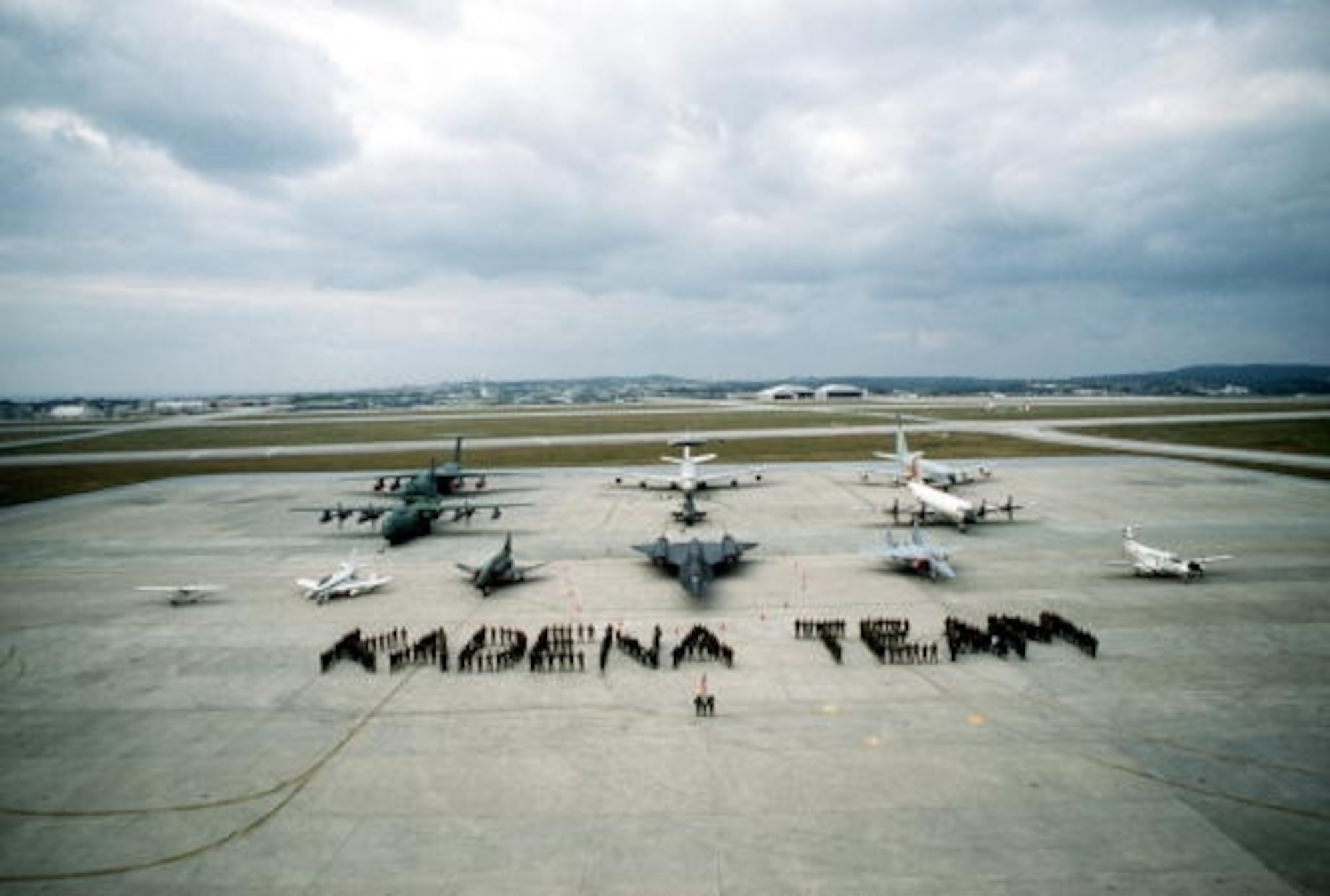Members of the Kadena Team in the 1980s pose for a picture on Service Apron 1 on Kadena. A photo similar to this one was taken Sept. 30 in the same spot. (Air Force file photo)
