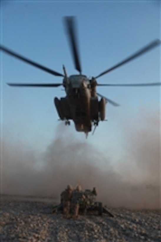 U.S. Marines with Helicopter Support Team, Combat Logistics Battalion 8 prepare to attach an M777A2 Lightweight Howitzer to a CH-53E Super Stallion helicopter at the landing zone on Fire Base Fiddler's Green in Helmand province, Afghanistan, on Sept. 28, 2009.  The Marines are transporting howitzers to broaden 3rd Battalion, 11th Marine Regiment's support of Regimental Combat Team 3, whose mission is to conduct counterinsurgency operations with Afghan National Security Forces in southern Afghanistan.  