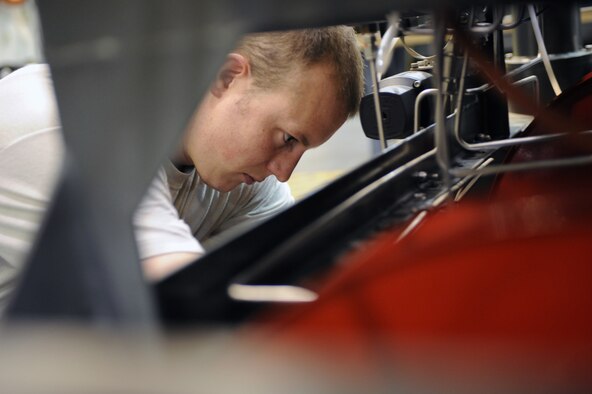 WHITEMAN AIR FORCE BASE, Mo. - Staff Sgt. David Teeters, 509th Maintenance Squadron aerospace ground equipment technician, performs an inspection on a self generating nitrogen servicing cart March 31, 2010. AGE mechanics ensure the equipment is operational to support the daily missions here.(U.S. Air Force photo/Staff Sgt. Jason Huddleston)  (Released)