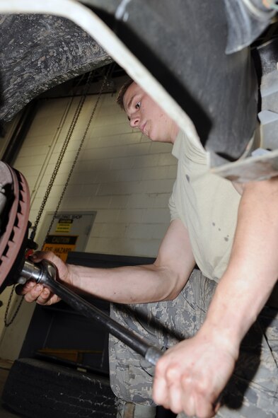 WHITEMAN AIR FORCE BASE, Mo. - Airman Joshua Schiltz, 509th Logistics Readiness Squadron vehicle maintenance technician, changes the wheel bearings on an Nuclear Certified Dodge Bobtail towing tractor. The 509th LRS vehicle equipment mechanics, perform daily maintenance on government vehicles to insure they are fully operational along with maintenance. Mechanics also perform their own upholstery and body work on government vehicles. (U.S. Air Force photo/Staff Sgt. Jason Huddleston)  (Released)