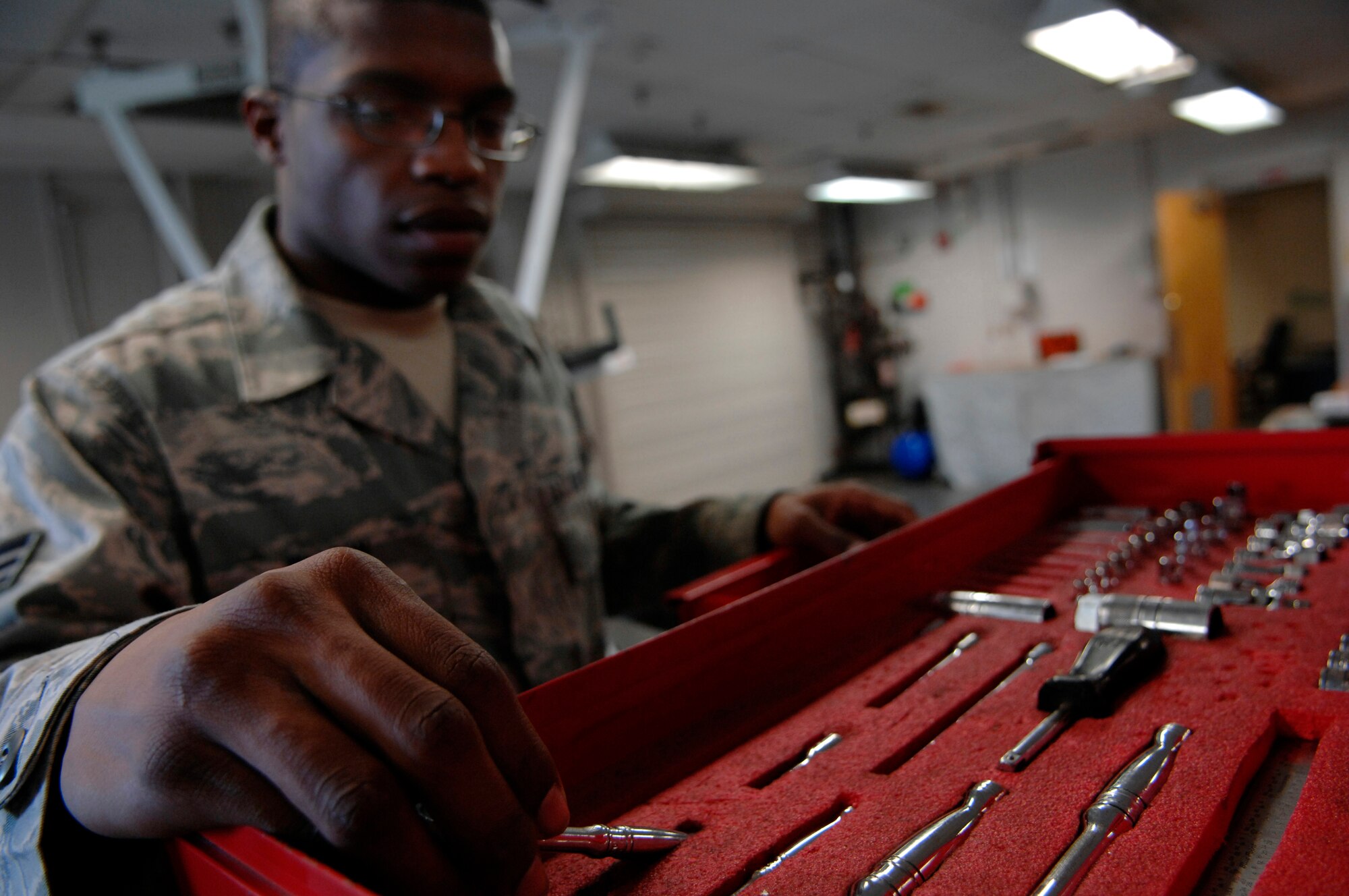 Senior Airman Michael Shaw chooses the right tool for the job at the rail maintenance shop March 26, 2010, on Joint Base Charleston, S.C.  Many unique and specialized aircraft parts require specifically designed tools to finish the job. Airman Shaw is a crew chief with the 437th Aircraft Maintenance Squadron. (U.S. Air Force photo/Senior Airman Timothy Taylor)
