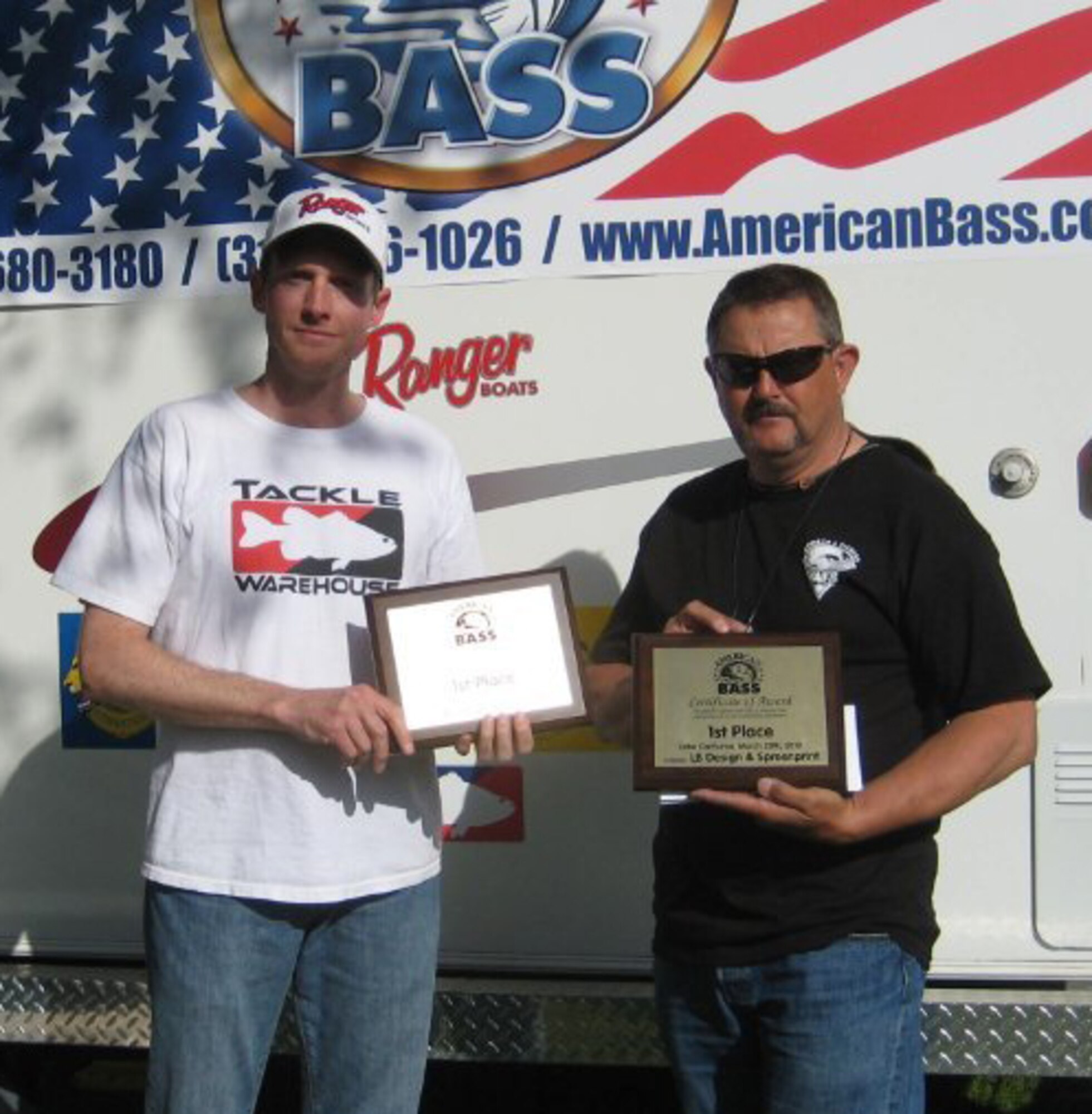 VANDENBERG AIR FORCE BASE, Calif. – Displaying their plaques, Master Sgt. Dean Krambeck, a 576th Flight Test Squadron NCO in charge, and Calvin Long, a 30th Logistics Readiness Squadron unit deployment manager, finished in first place at the Pacific Coast Region’s American Bass team tournament at Cachuma Lake near Santa Barbara on March 20. Sergeant Krambeck and Mr. Long are currently preparing for the next regional American Bass tournament at Lopez Lake near Arroyo Grande April 10. (Courtesy photo) 