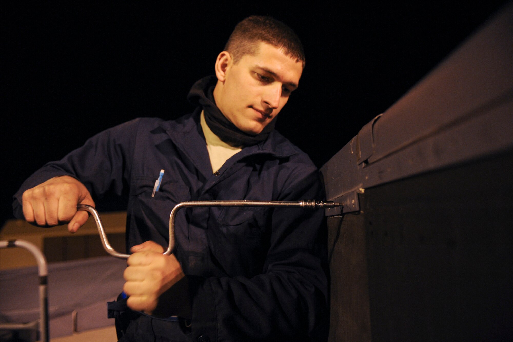 ELLSWORTH AIR FORCE BASE, S.D.-- Airman 1st Class Zach Ferris, 28th Aircraft Maintenance Squadron crew chief, installs an over wing fairing seal, March 31. The 28th Aircraft Maintenance Squadron is the largest squadron in the 28th Bomb Wing and manages the on-equipment maintenance, weapons loading and support activities of the B-1B Lancer. (U.S. Air Force photo/Airman 1st Class Corey Hook)
