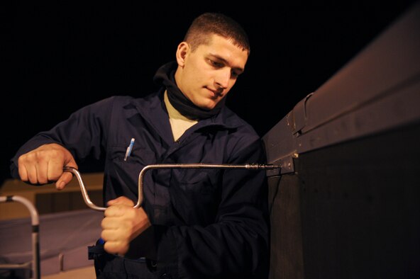 ELLSWORTH AIR FORCE BASE, S.D. -- Airman 1st Class Zach Ferris, 28th Aircraft Maintenance Squadron crew chief, installs an over-wing fairing seal, March 31. The 28th Aircraft Maintenance Squadron is the largest squadron in the 28th Bomb Wing and manages the on-equipment maintenance, weapons loading and support activities of the B-1B Lancer. (U.S. Air Force photo/Airman 1st Class Corey Hook)