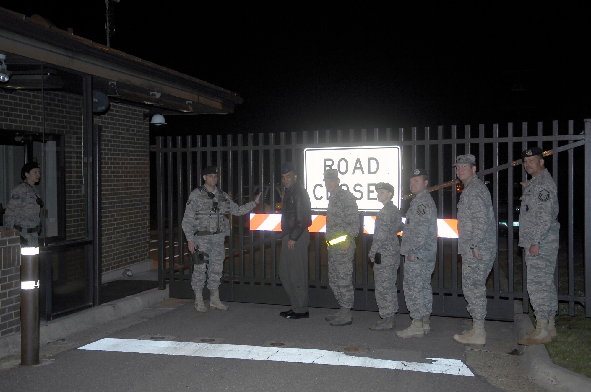 Pope leadership and security forces personnel open the gate on Armistead Rd. on April 1 for the first time in more than two years. (U.S. Air Force photo/Senior Airman Kris Levasseur)