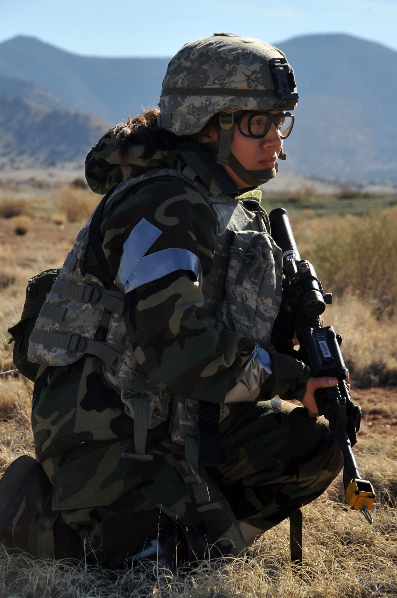 Staff Sgt.Elizabeth McBride, 377th Security Forces Squadron,secures the area with her team during an exercise here March 17.

U.S. Air Force Photo by Elizabeth Martinez